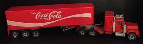 10390-1 € 15,00 coca cola vrachtwagen enjoy coca cola truck ijzer oplegger plastic 32 cm.jpeg